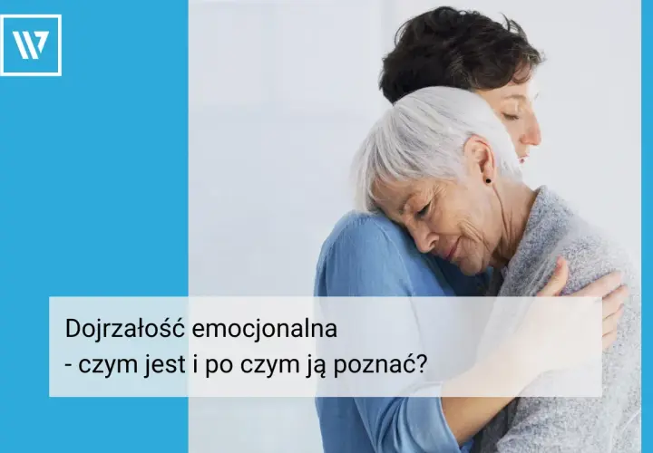 Dwie kobiety w uścisku, symbolizujące dojrzałość emocjonalną i wsparcie.