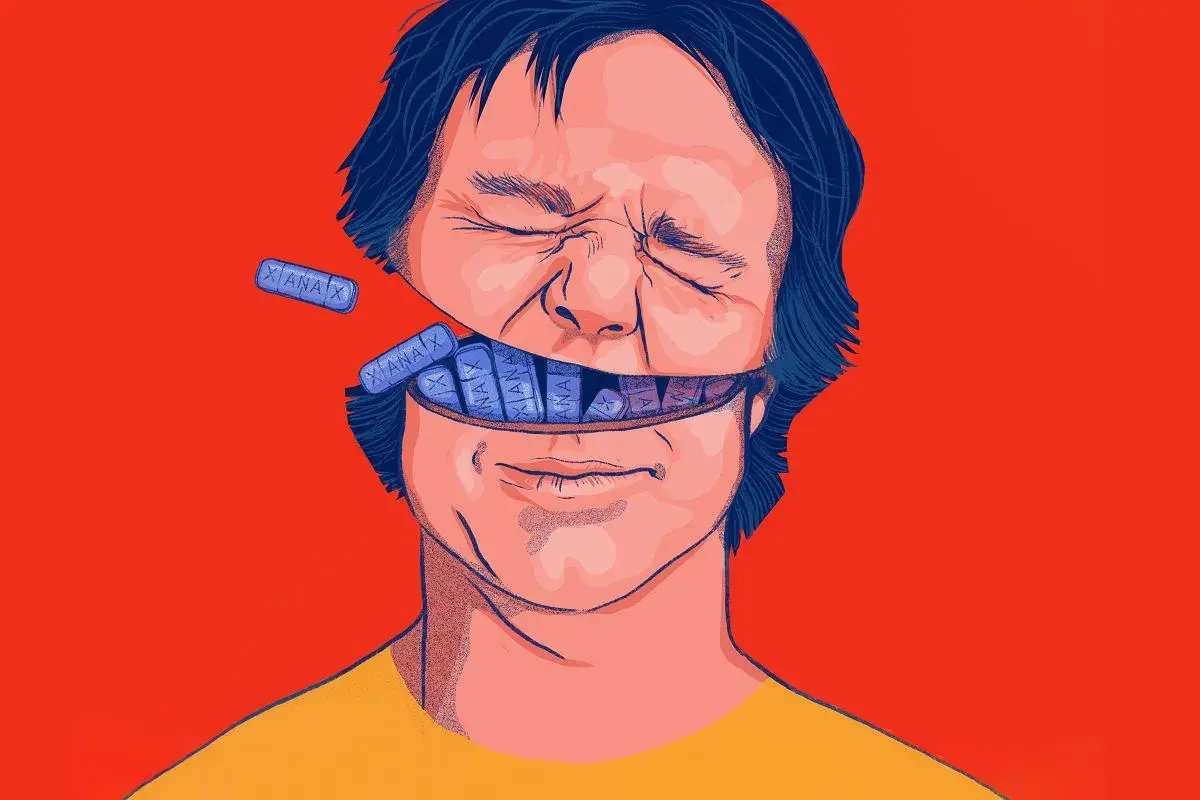 Otwarta głowa mężczyzny wypełniona tabletkami Xanax. Ilustracja przedstawia potencjalne xanax skutki uboczne.