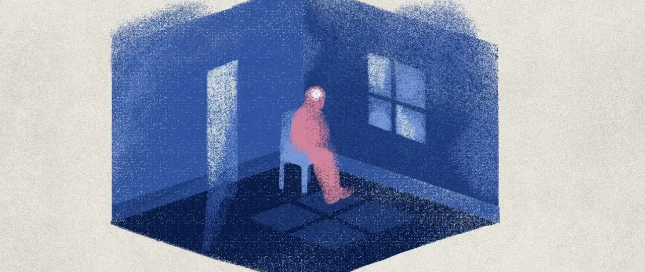 Samotna postać w różowym ubraniu siedzi na krześle w niebieskim pokoju. Światło wpada przez okno i drzwi, ale nie rozprasza mroku. To obraz najbardziej depresyjnego dnia w roku.